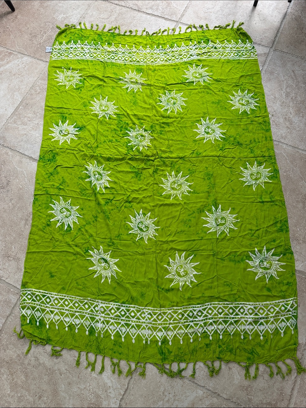Women’s beach sarong wrap. 64” around 41” length. Lime green and white Suns